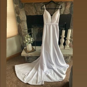 White spaghetti strap wedding dress